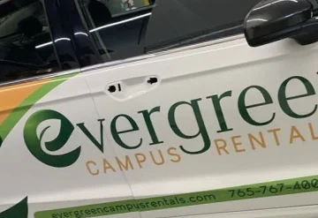 Evergreen Campus Rentals Partial Wrap — wrap installation by Leidy MV