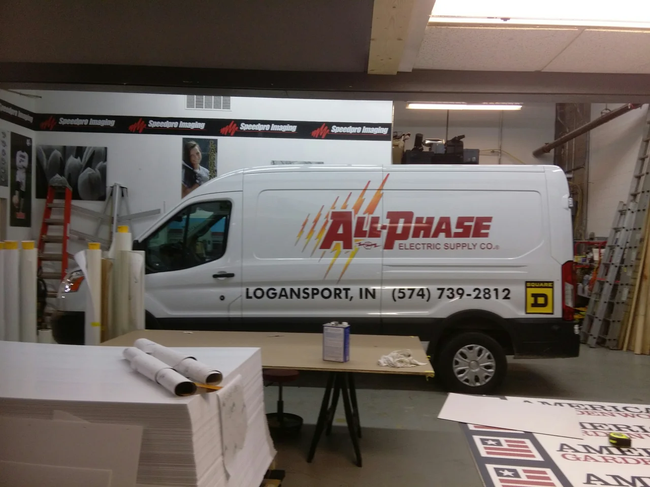 All Phase Electric van wrap and display graphics