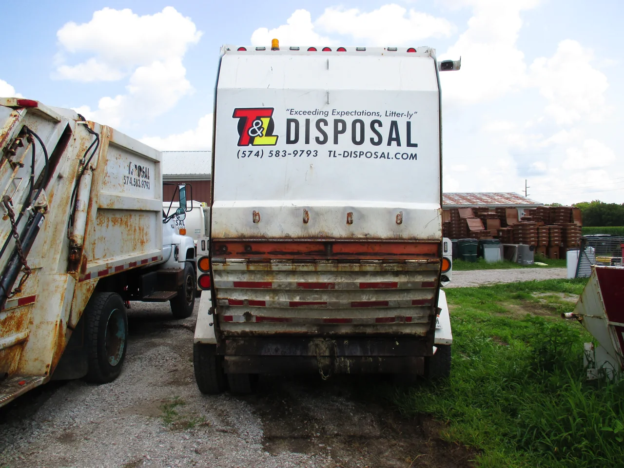 T&L Disposal reflective rear truck decals