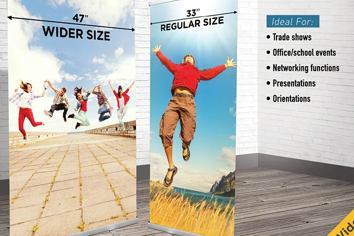Wide retractable banner stands with printed graphics